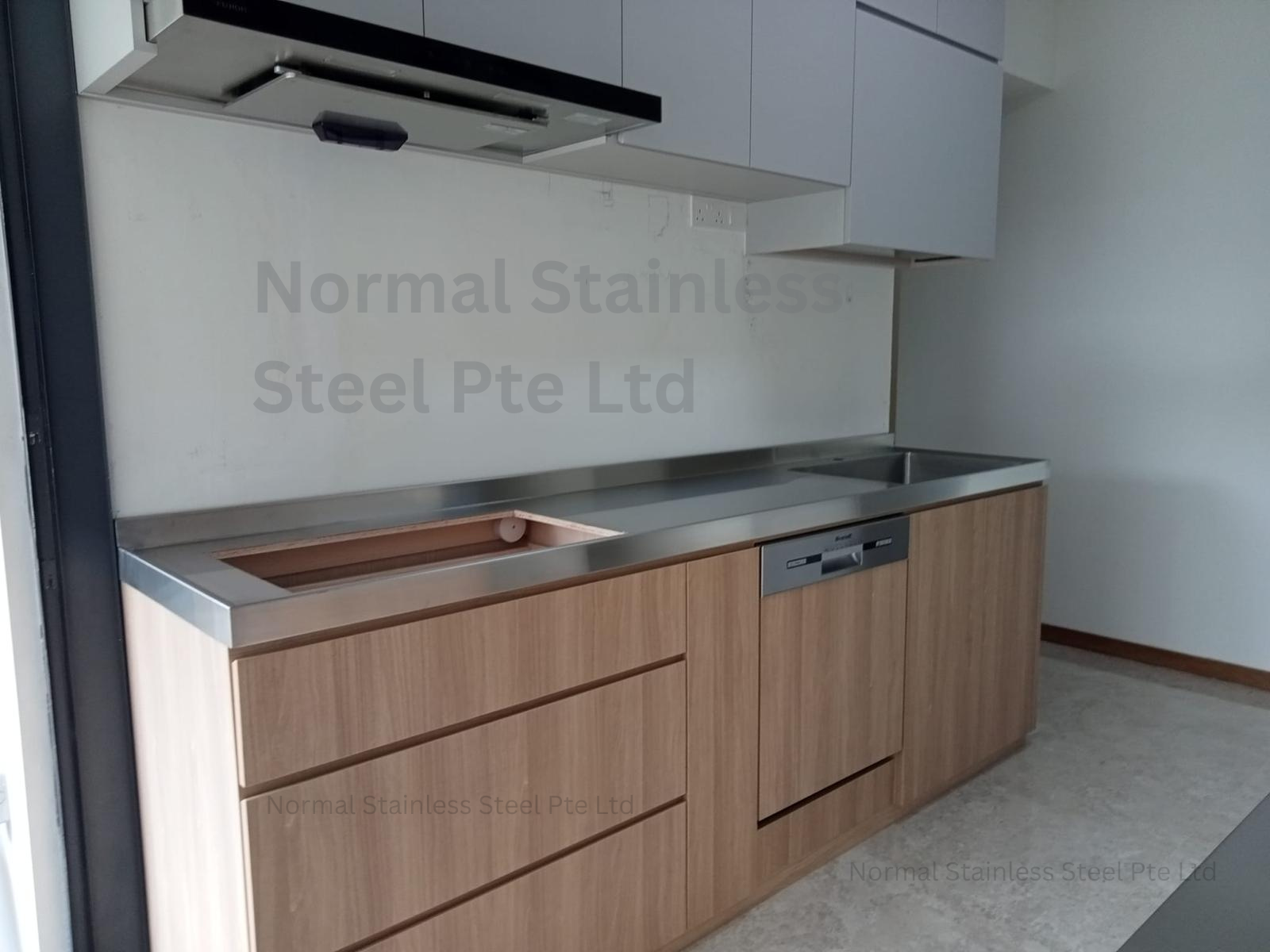 stainless steel counter top with sink and hole for hob